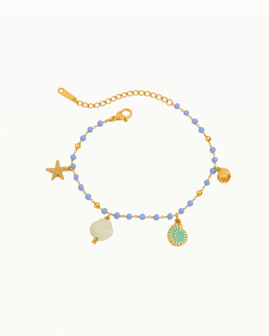 Gouden Armband met Blauwe Kralen & Zee Bedels - Brigitta