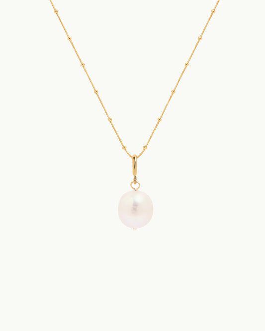 Goudkleurige Ketting met Parel Hanger en Subtiele Details - Frankie